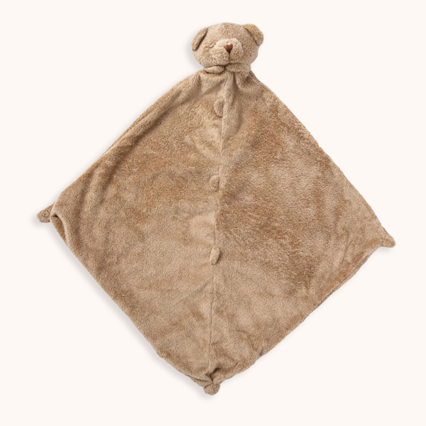 A soft plush security blanket shaped like a teddy bear, featuring a rounded bear head and a soft diamond-shaped body in a warm tan color, shown on a light cream background.