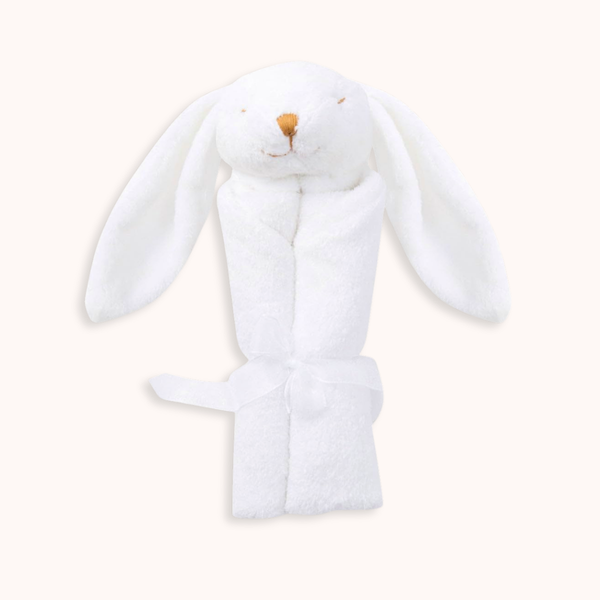 A white plush bunny hooded bathrobe with long floppy ears, a stitched bunny face, and a matching tie belt, shown on a plain light cream background.