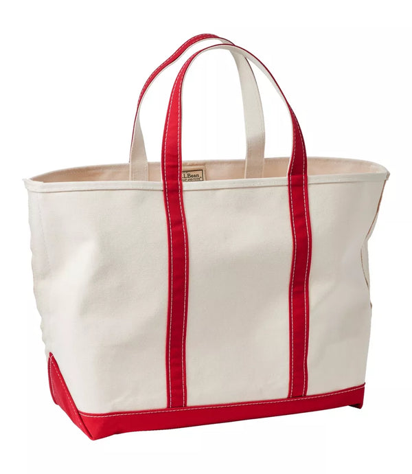 An off-white canvas tote bag with bright red trim, double shoulder straps, and a red bottom base, shown on a plain white background.
